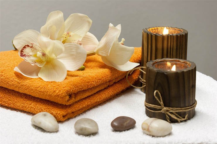 Spa candle candles flower flowers stone stones rock rocks towel towels