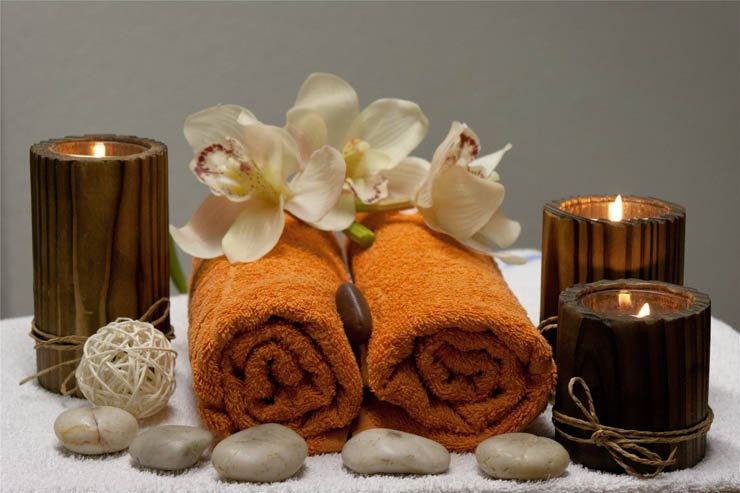 Spa candles candle rocks rock stones stone flowers flower roses rose towels towel