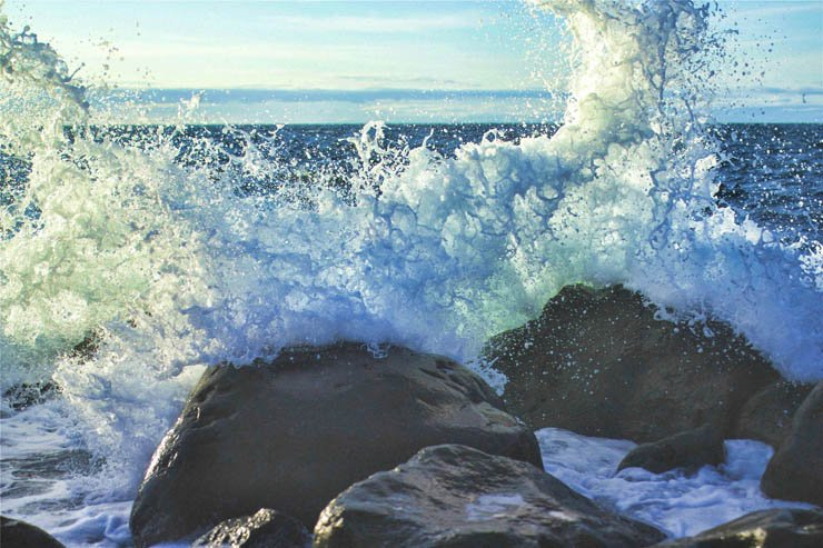 Waves wave crash crashing huge rock sky sea water ocean nature