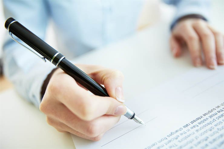 Writing sign pen paper contract hand signature office business work job