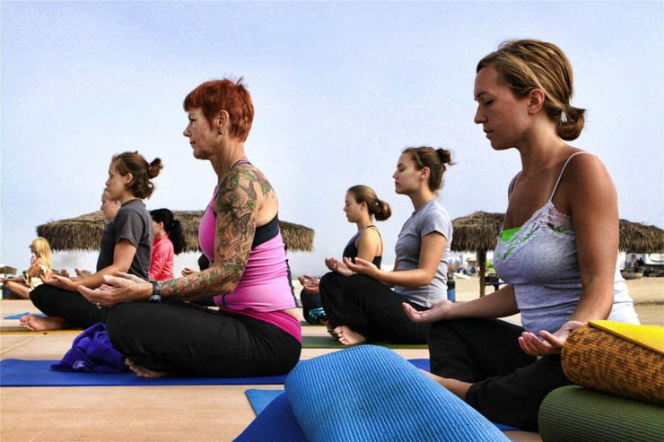 Yoga group mat mats ladys women relaxing sit sitting sky pose exercise meditation