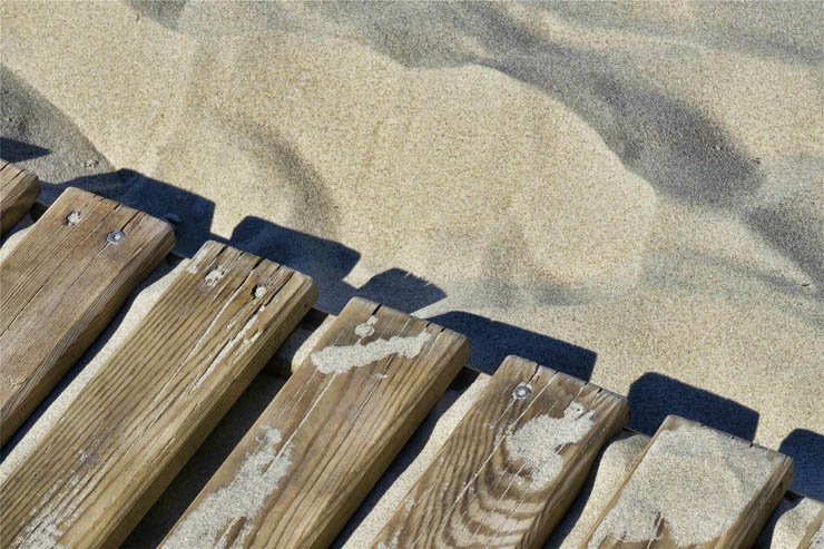beach sand sandy wood wooden pathway