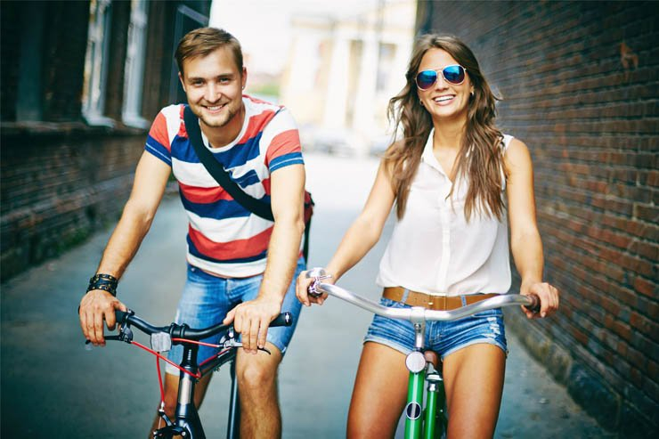 bike bicycle biking woman man couple summer love happy smile romance romantic street