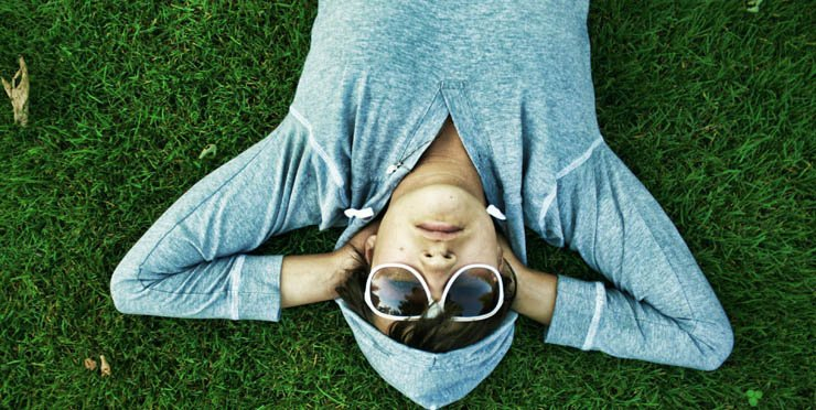 boy lay relax laying down grass nature enjoy sun glasses sunglasses