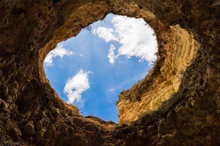 cave sky cloud clouds underground under ground nature desert