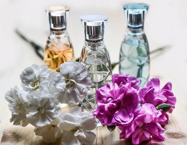colorful flowers essential oil bottles