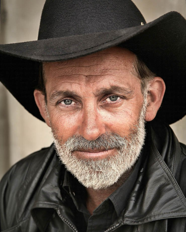 cowboy man male adult old beard jacket leather farm hat