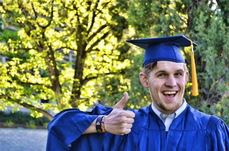 education college graduate graduation hat happy smile thumb student