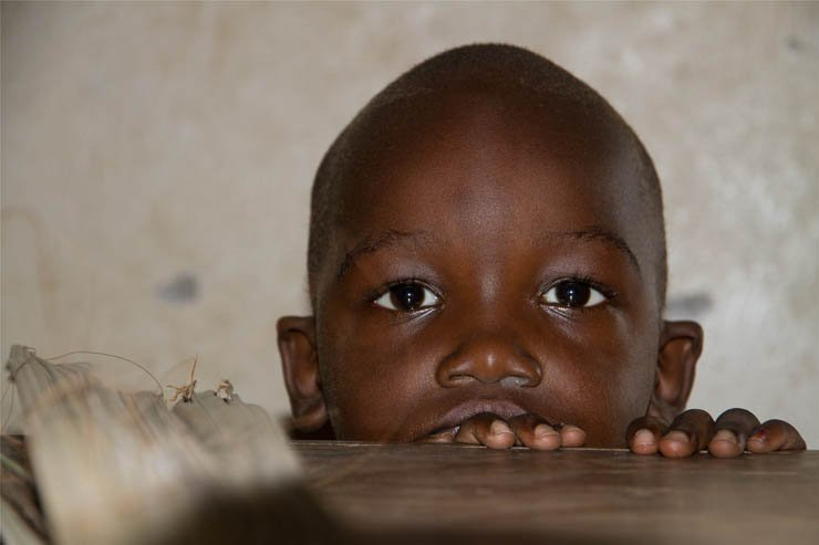 face faces africa african village kid kids boy sad wait