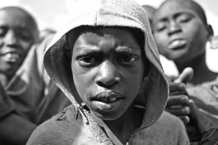 face faces africa african village kid kids boys boy hoodie