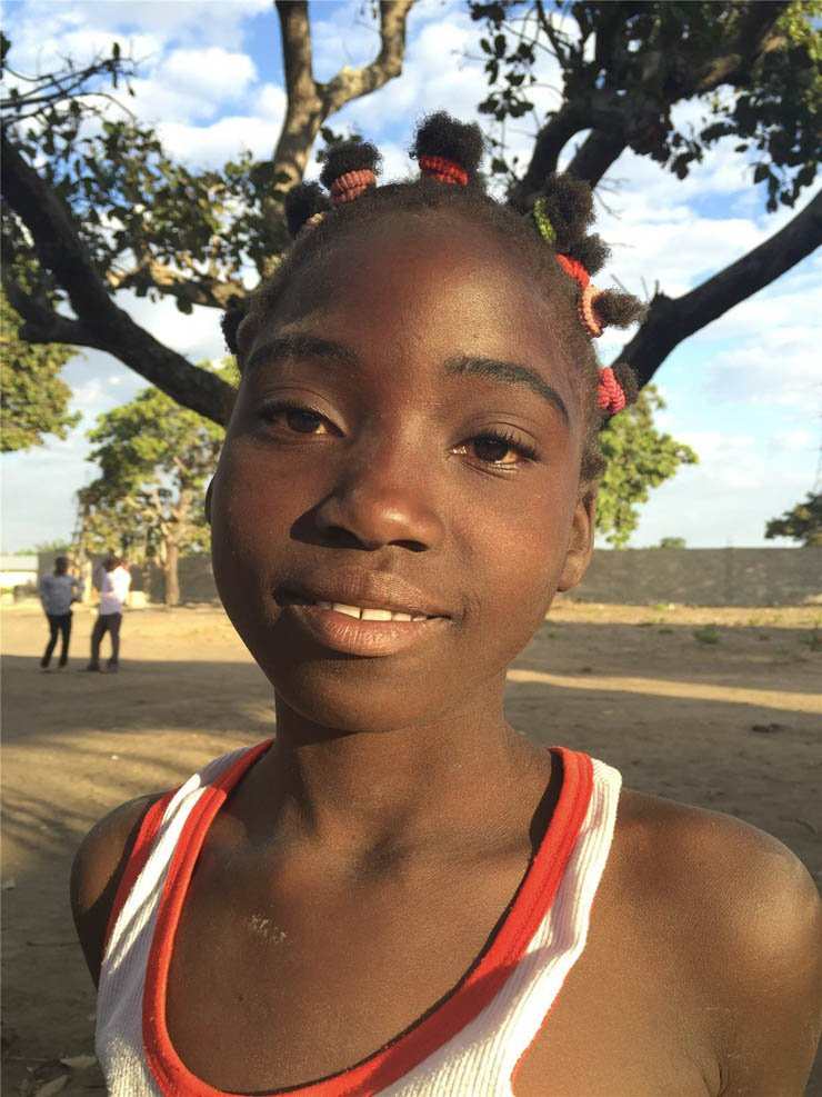 face faces africa african village kid kids girl smile