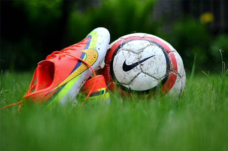 green football soccer ball shoe shoes balls grass field match play player playing