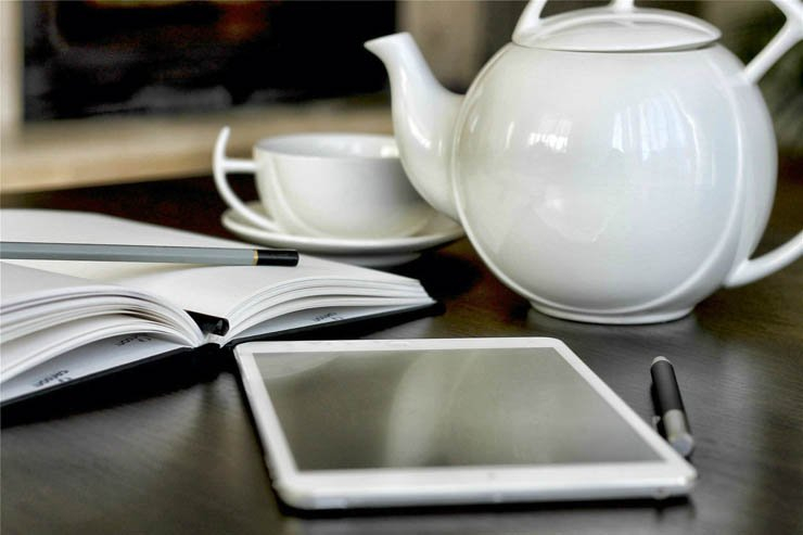 ipad tablet tech technology pot cup mug pen pencile notebook work study