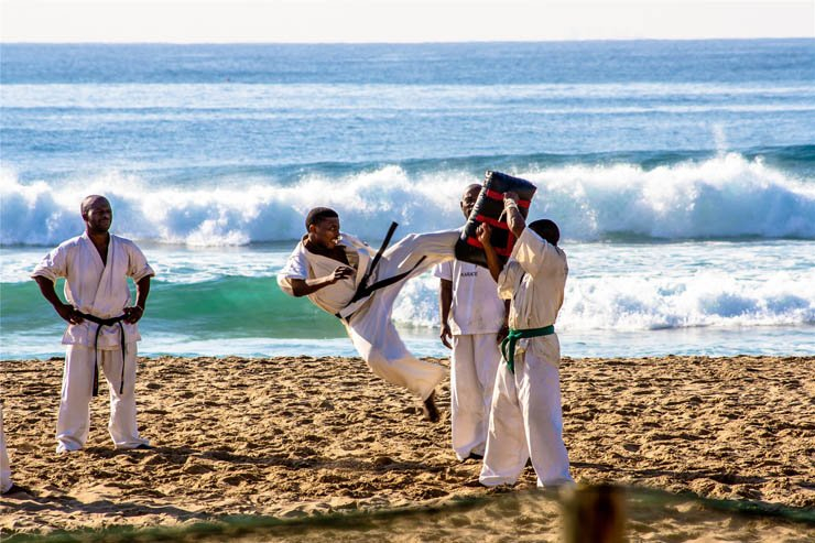 karate train training workout working out martial art arts beach kick fight sand sea wave waves ocean