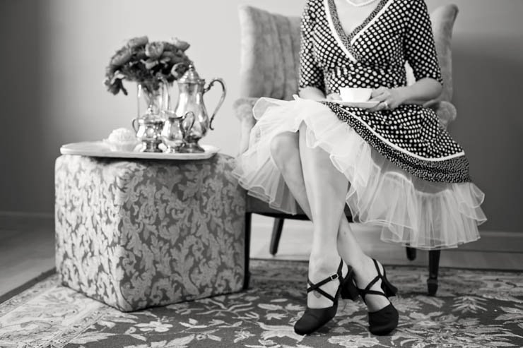 lady girl drink tea coffee teapot pot flowers black white table chair