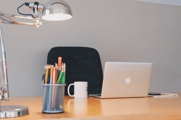 lamp chair desk office room employee mug cup laptop mac macbook pencil pencils mobile phone business tech technology