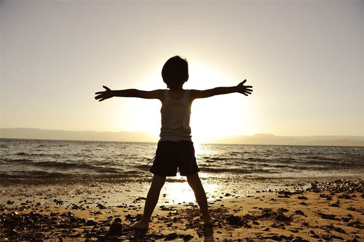 little boy kid sunset beach shore sea ocean back sand