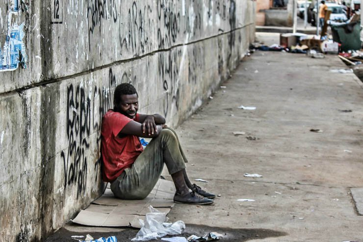 man men homless street wall africa african