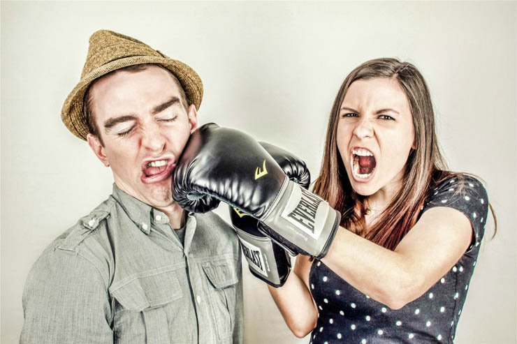 man woman punch boxing angry fight fought couple gloves