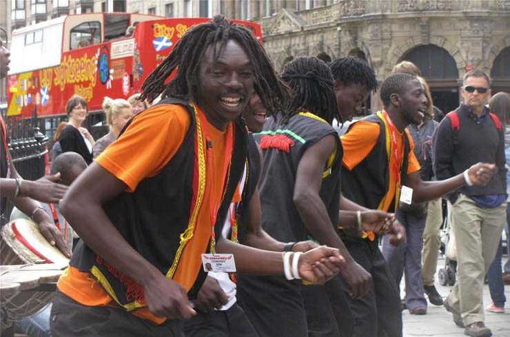 men dance dancing happy festival ceremony street africa