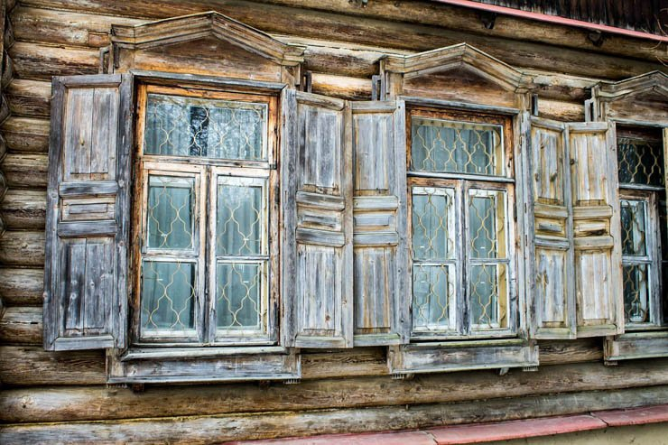 old ancient vintage windows wooden house