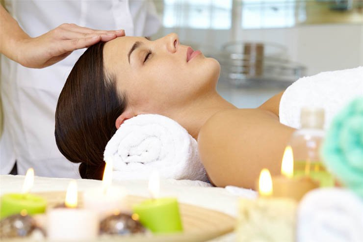 relaxing lady massage spa candles towels