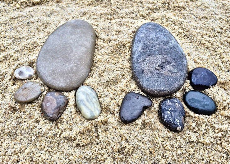 shape feet stones rocks sand beach