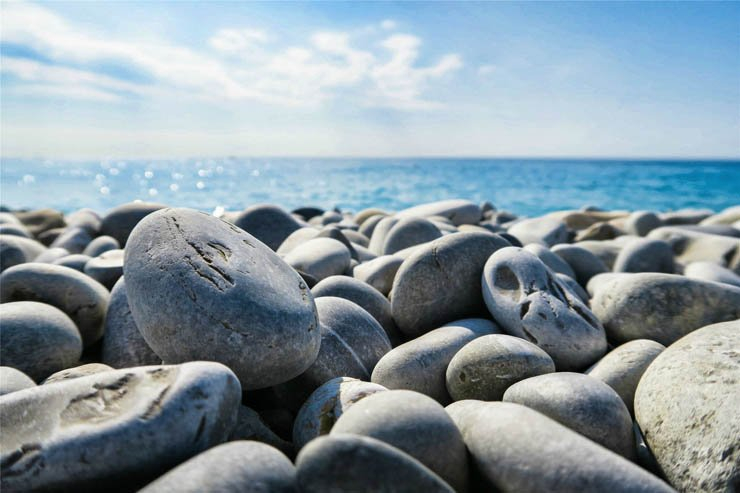 stones beach sea rock rockssky ocean sunny