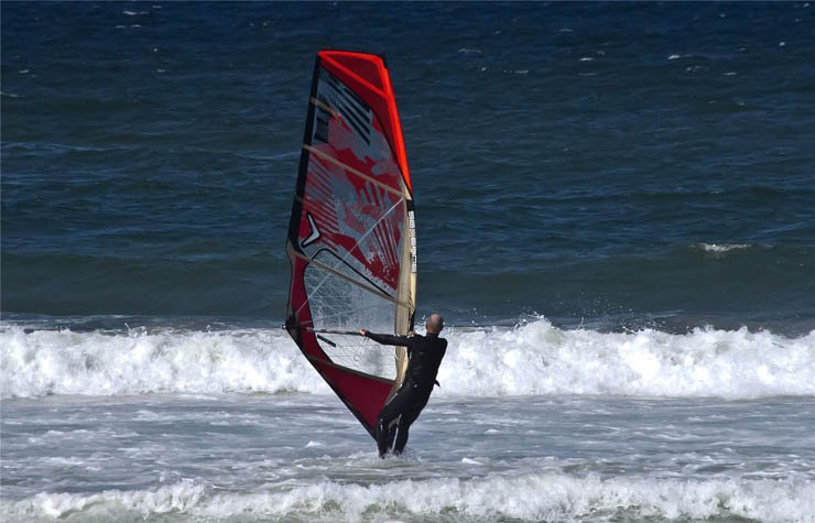 wind surfer wave waves man sea water ocean sport