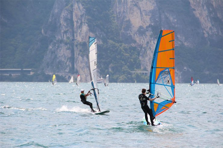 wind surfing men sport plateau water sea ocean