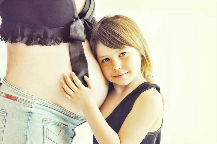 woman pregnant kid hold hug belly child baby lady girl