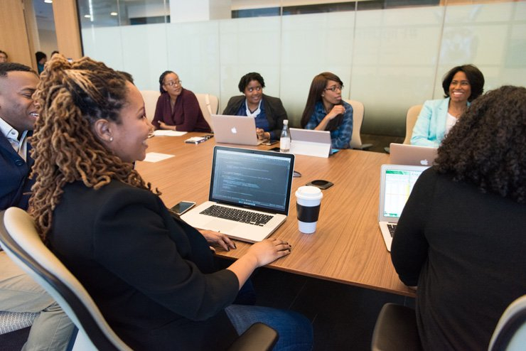 business finance formal job work employee working board meeting women woman management laptop room office