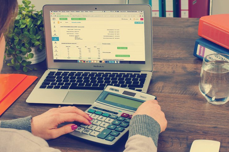 entrepreneur finance accounting finance financial business laptop pen book accountant ledger calculator calculate