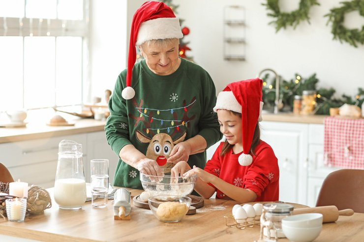 family mother baking daughter christmas grandma grandmother mom cookie bake kitchen cooking xmas holiday cookies sweet
