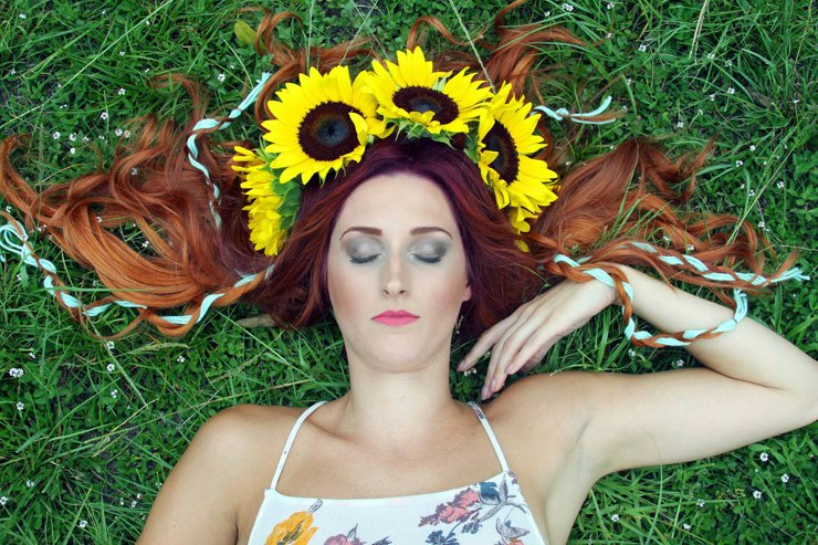 fashion beauty elegant elegance style stylish fashionista fashionable outfit laying down lady woman women makeup dress flower sunflower grass garden redhead hair crown ginger