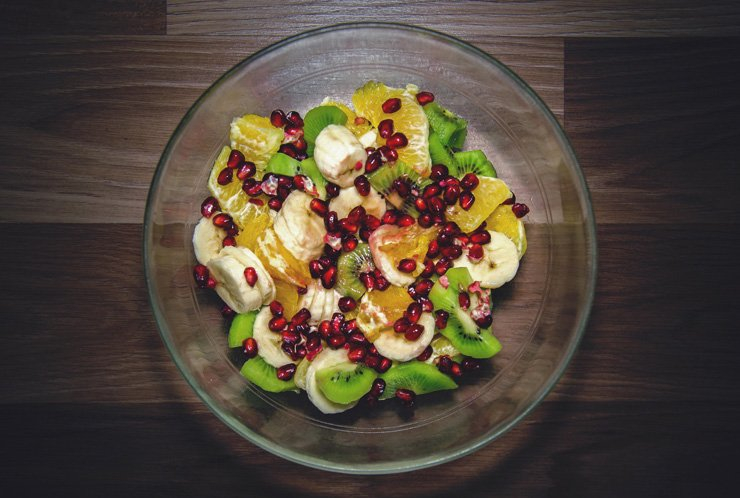 fruit fruits food healthy health diet glass bowl orange banana kiwi pomegranate wood wooden salad