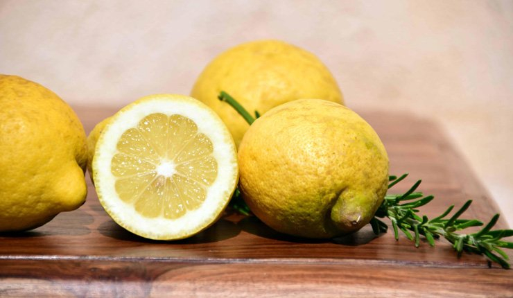 fruit fruits food healthy health diet lemon rosemary wood wooden table