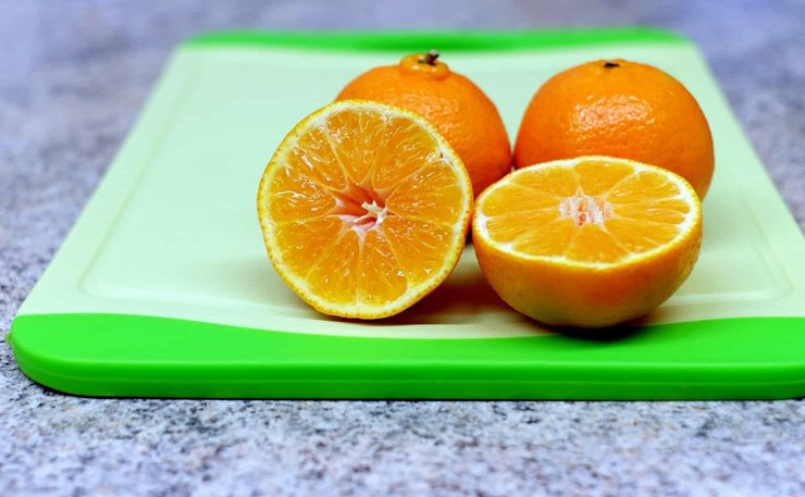 fruit fruits food healthy health diet orange cutting board