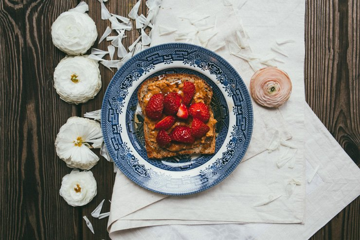 fruit fruits food healthy health diet peanut butter plate dish french toast strawberry napkin dessert flower wood wooden table