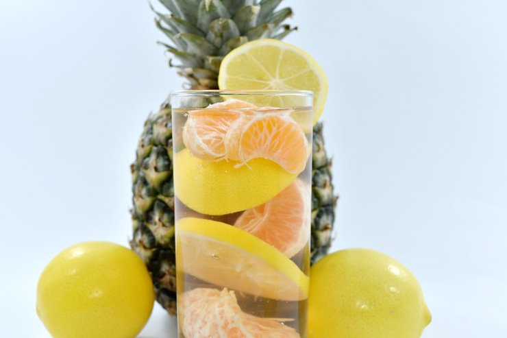 fruit fruits food healthy health diet vitamins lemon slice tangerine pineapple water