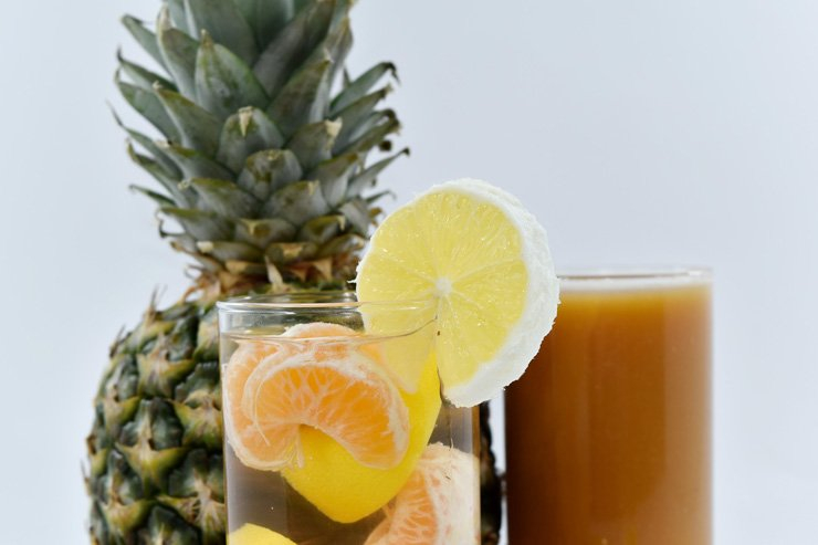 fruit fruits food healthy health diet vitamins lemon slice tangerine pineapple water juice