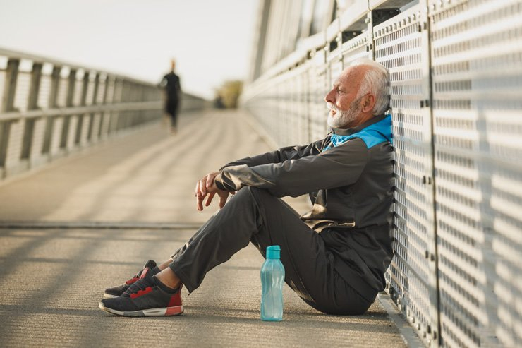 tired rest exhausted fitness training health sports outdoor workout senior old man bottle water