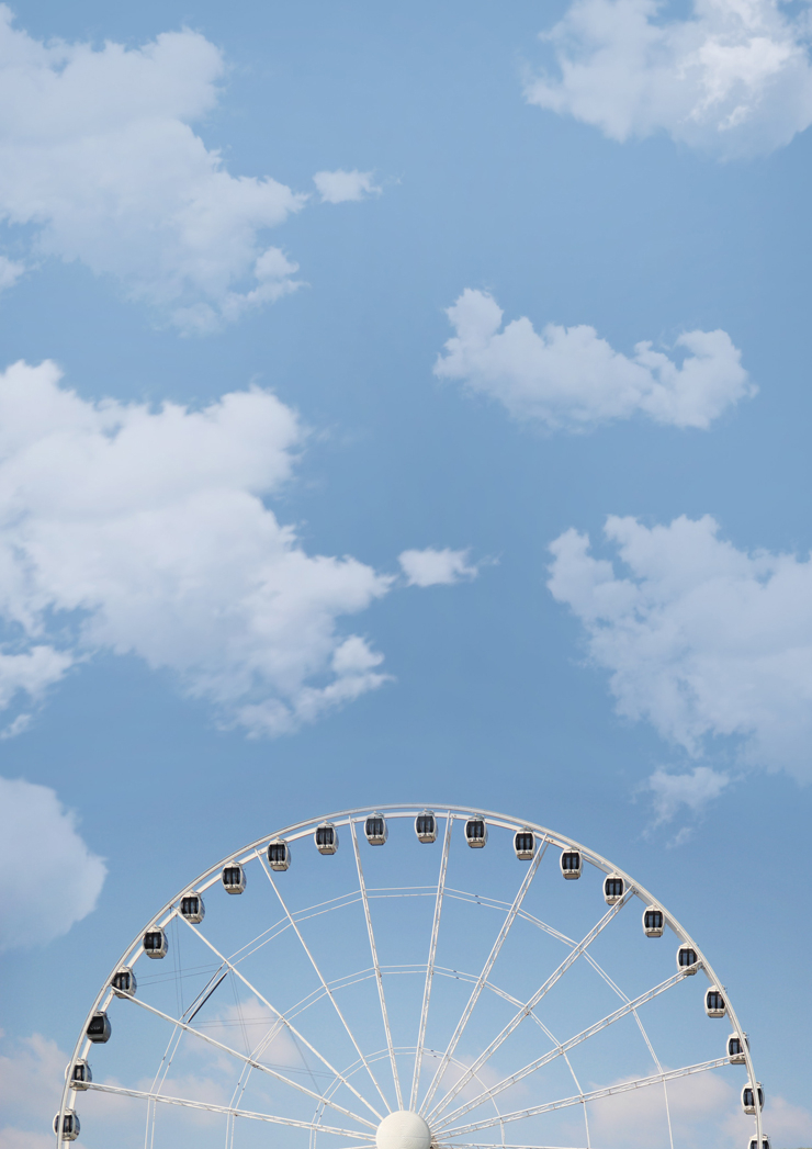 Big Wheel With Cloudy Sky