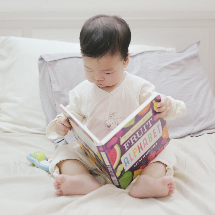 Baby Reading a Book