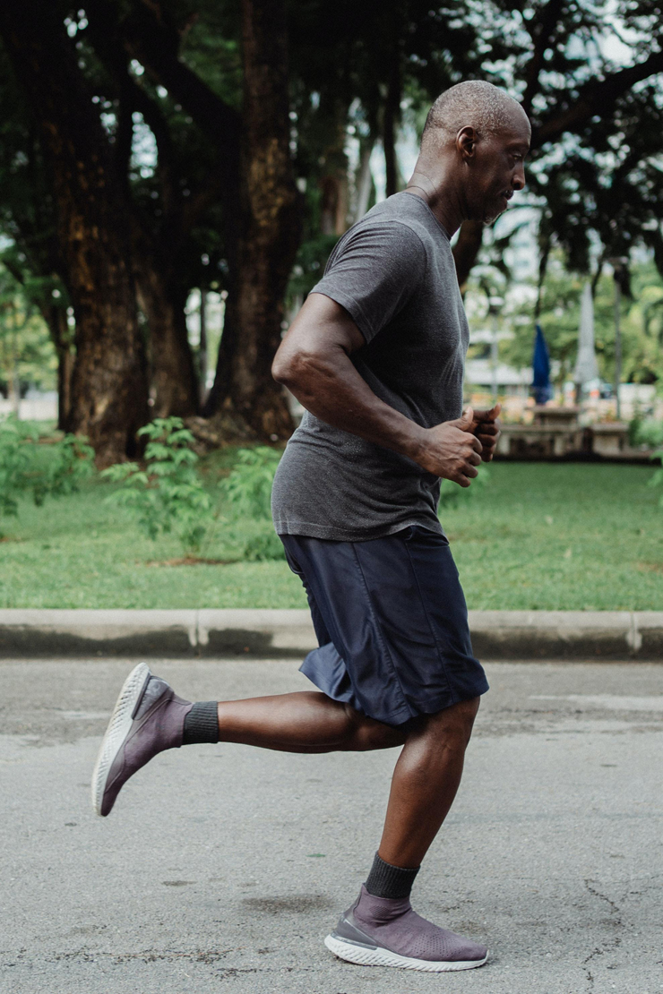 
									Man Jogging In Street At Morning