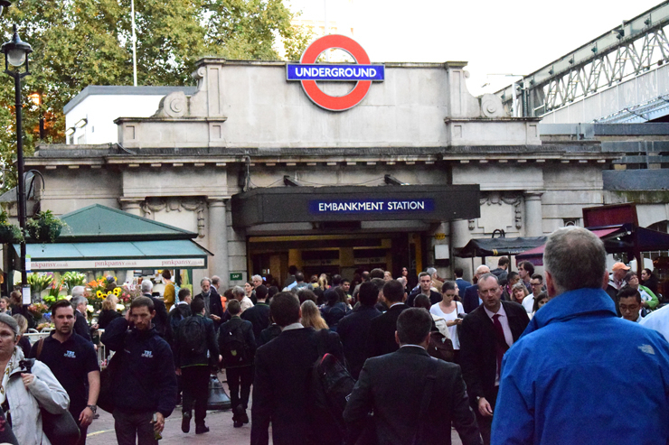 People Walking in front of Station