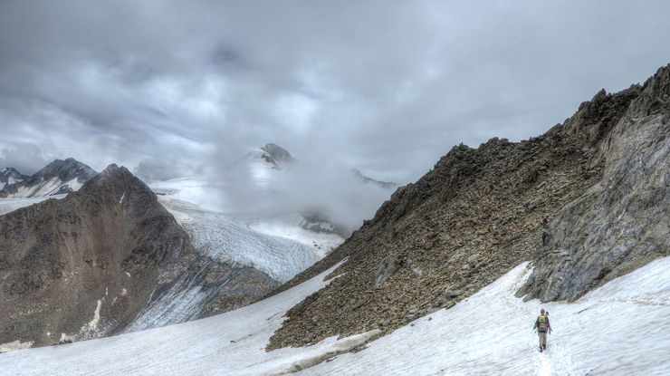 
									People Walking in the Snowy Mountain