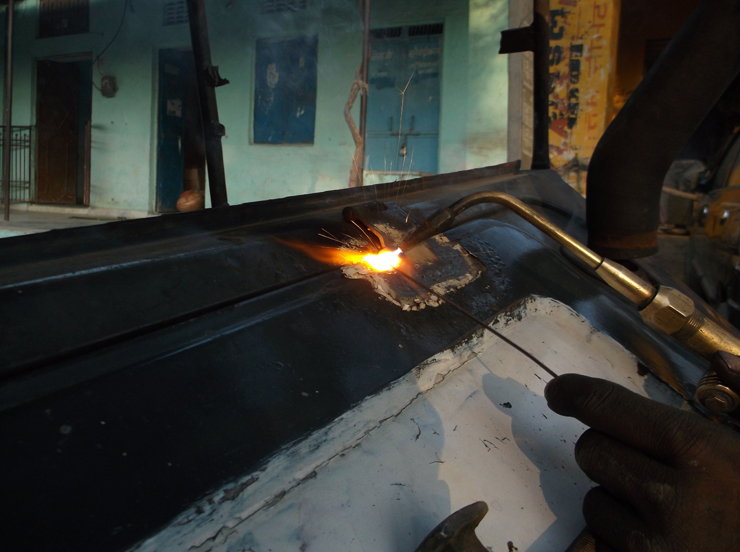 Person Welding a Surface