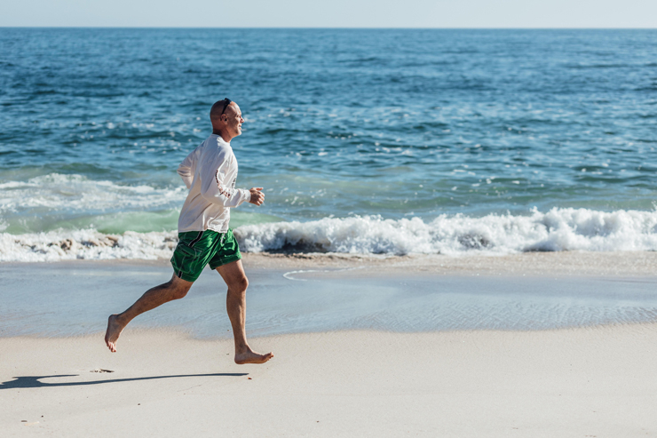 Man Running On The Beach